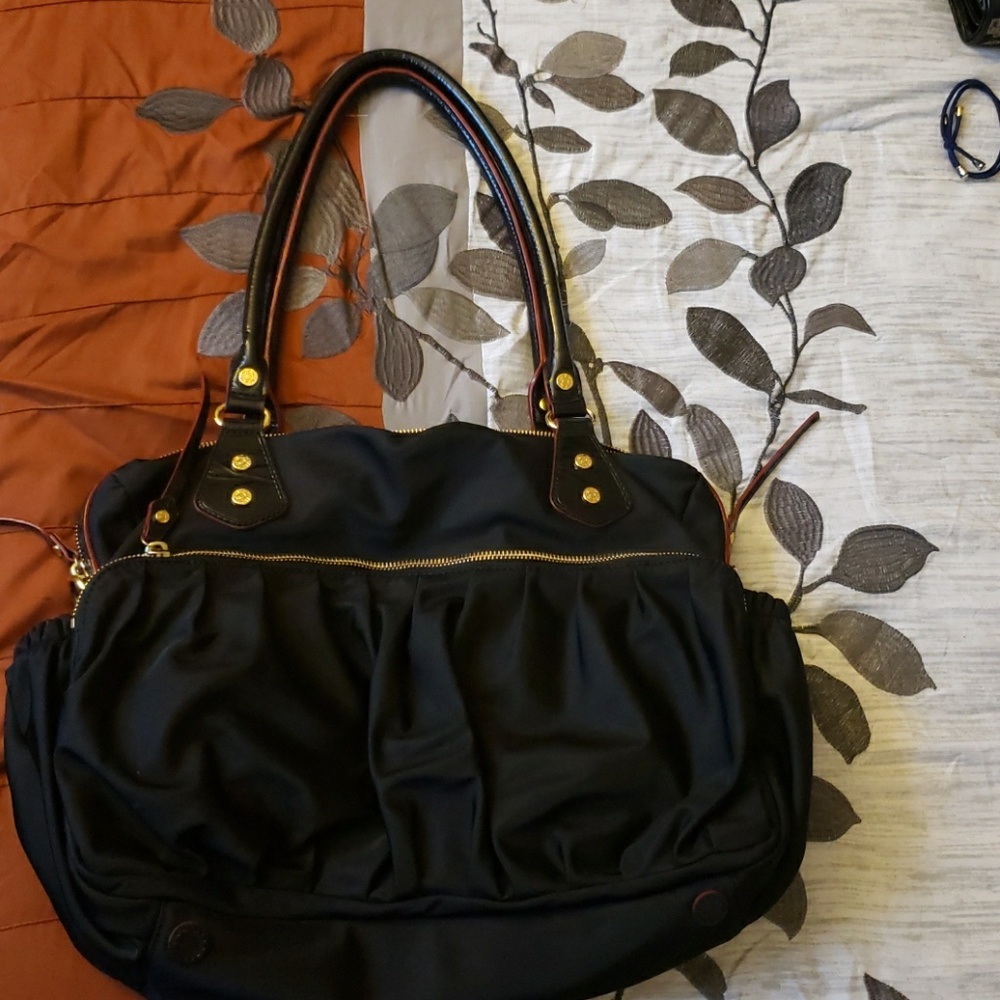 Kate bag like new. Only used couple times.